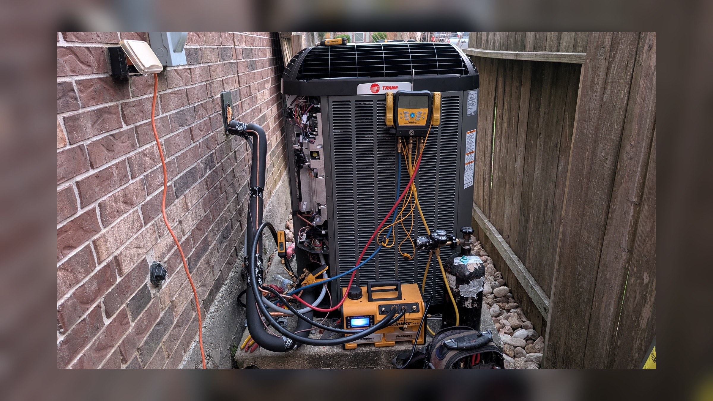 Residential HVAC service in progress